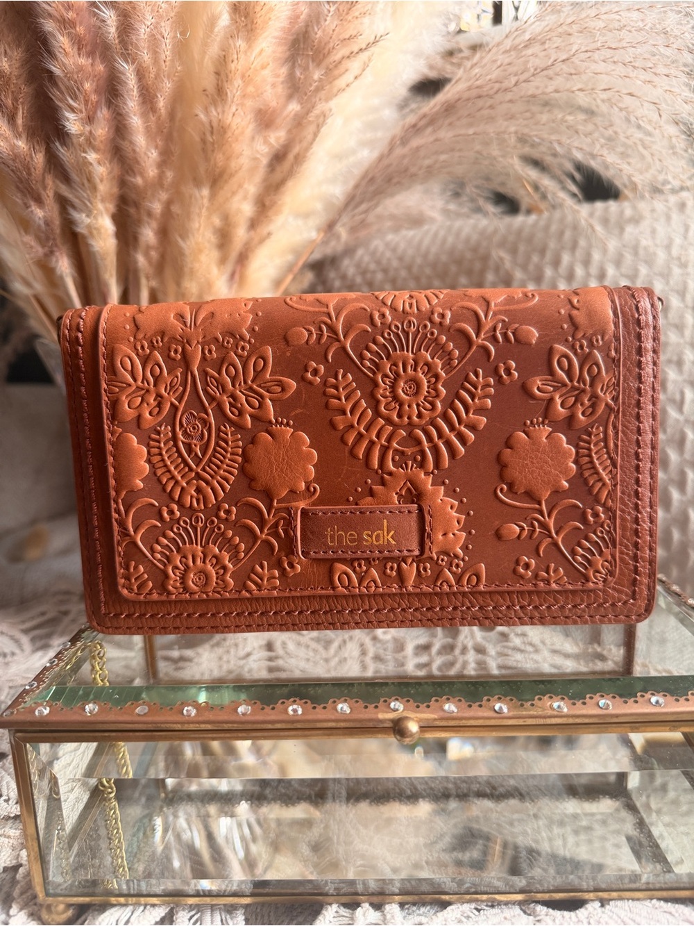 The Sak Genuine Leather Floral Embossed Willow Wallet in Cognac Brown